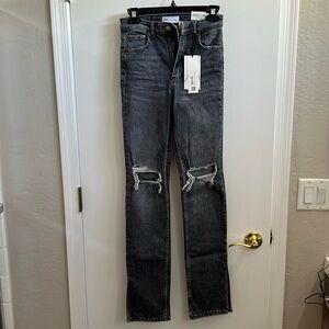 High-rise full length split skinny jeans, Zara.